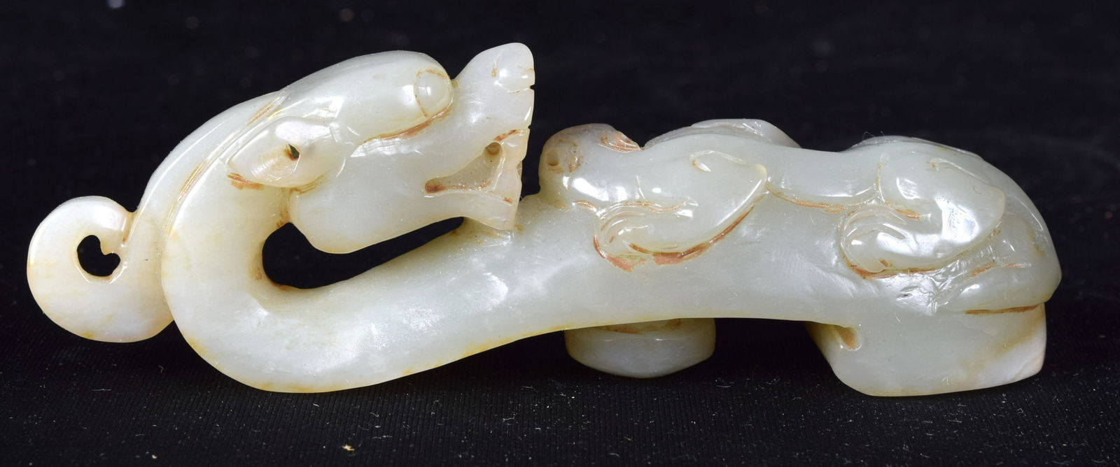 A Chinese carved Jade dragon buckle. 12cm (1 of 4)