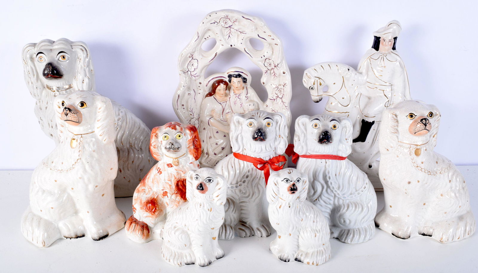 A collection of Staffordshire Flat back figures largest (1 of 9)