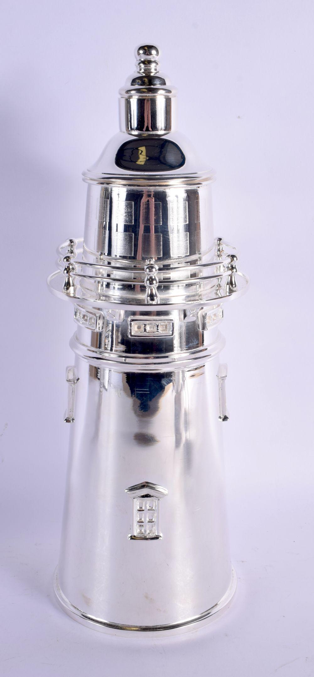 A LARGE CONTEMPORARY SILVER PLATED LIGHTHOUSE COCKTAIL SHAKER. 35 cm x 12 cm. (1 of 5)