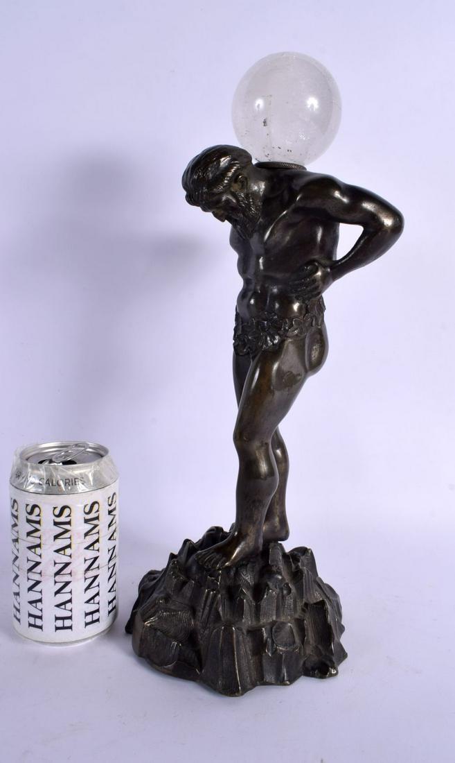 A 19TH CENTURY EUROPEAN GRAND TOUR BRONZE FIGURE OF HERCULES modelled with hands on his hips upon a: A 19TH CENTURY EUROPEAN GRAND TOUR BRONZE FIGURE OF HERCULES modelled with hands on his hips upon a naturalistic base. 39 cm high.