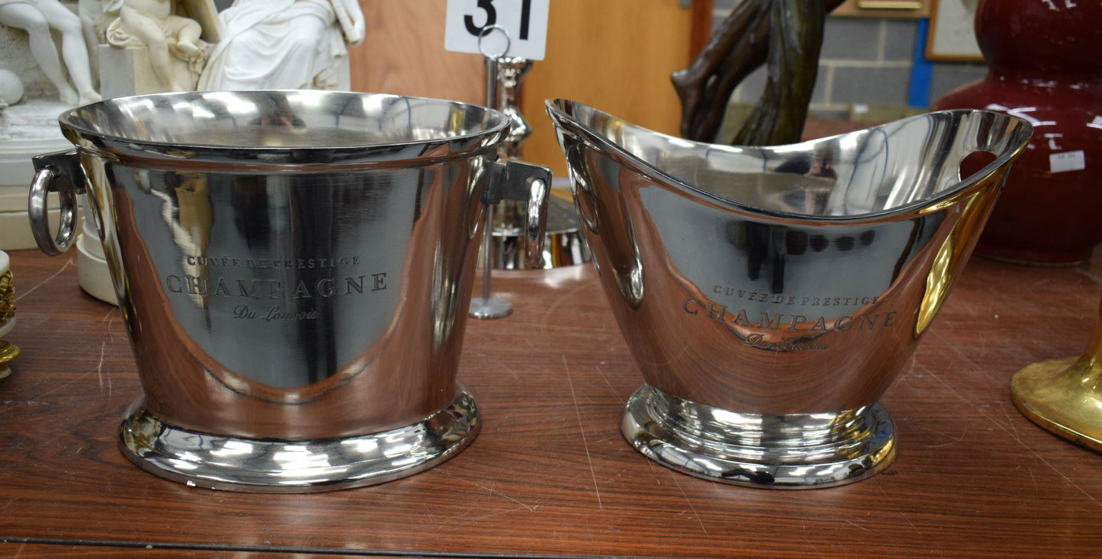 A PAIR OF CONTEMPORARY SILVER PLATED WINE COOLERS. 25 cm x 35 cm.: A PAIR OF CONTEMPORARY SILVER PLATED WINE COOLERS. 25 cm x 35 cm.