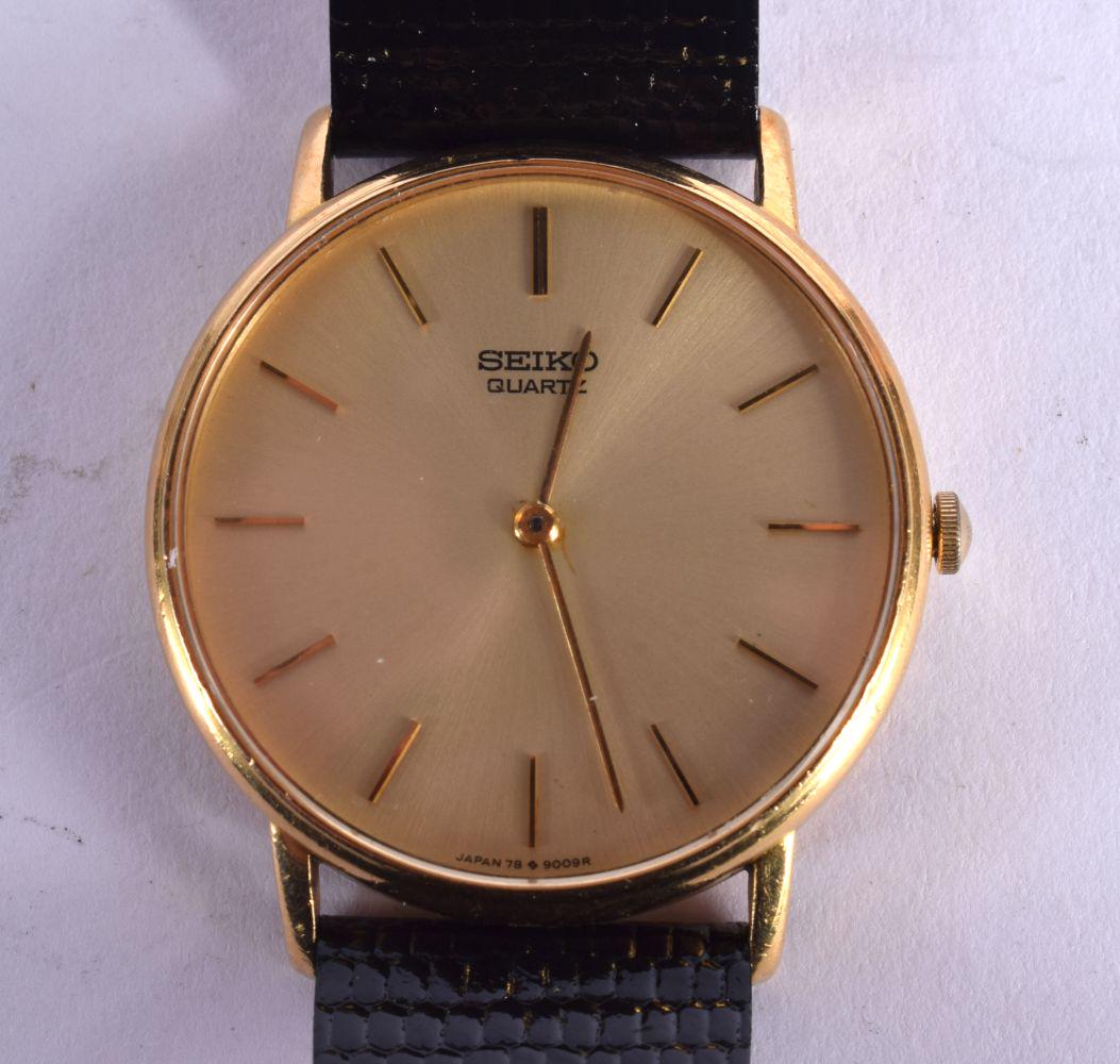 18CT GOLD CASED SEIKO QUARTZ WATCH.  Case stamped 18K, Dial 3.4cm incl crown, weight 35.4g (1 of 2)