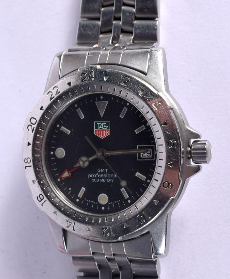 TAG HEUER 159.306/1 GMT PROFESSIONAL 200M STAINLESS STEEL QUARTZ. Dial 4.3cm incl crown, weight 117: TAG HEUER 159.306/1 GMT PROFESSIONAL 200M STAINLESS STEEL QUARTZ. Dial 4.3cm incl crown, weight 1174.7g
