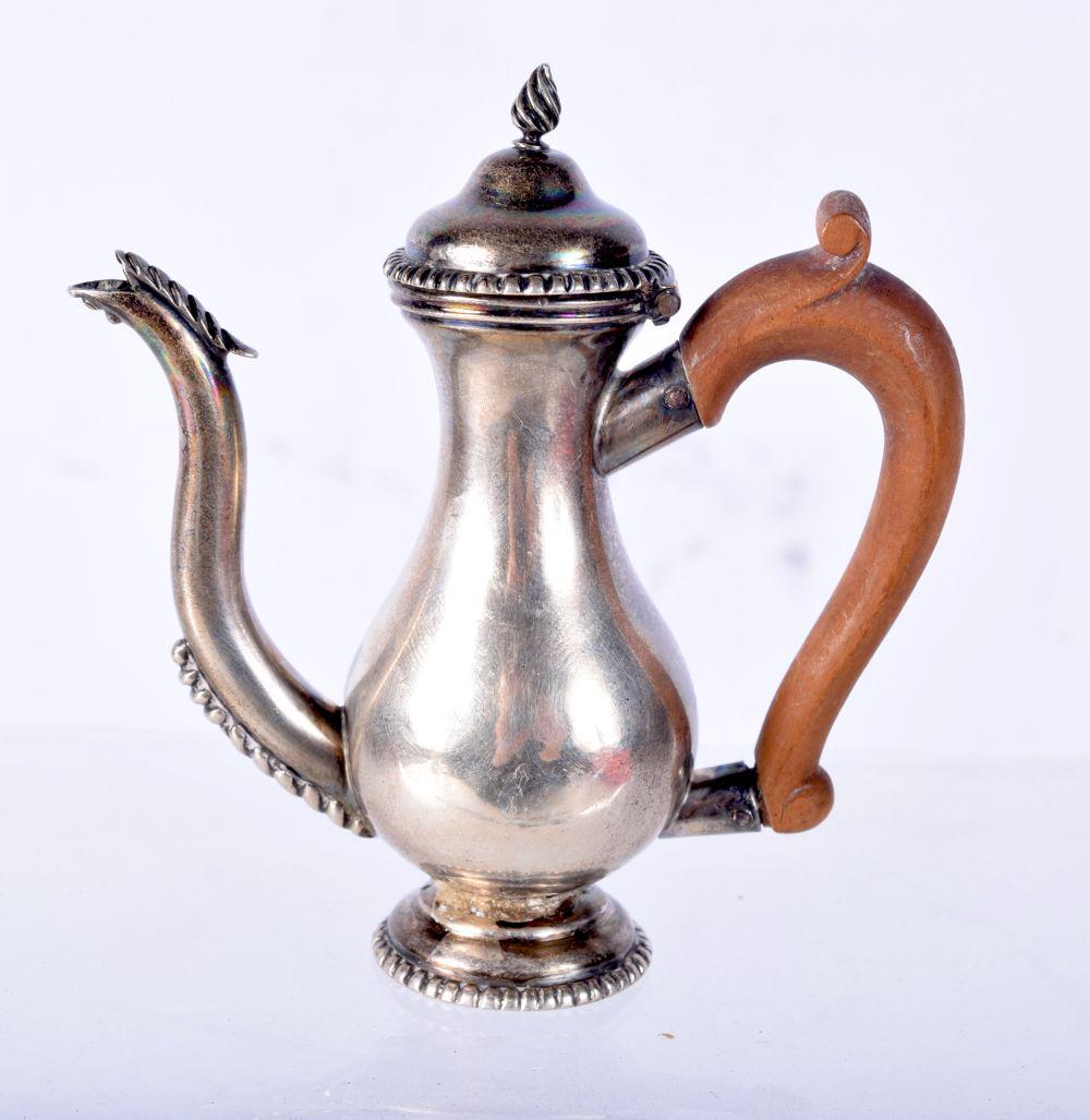 A CONTINENTAL SILVER MINIATURE COFFEE POT.  8cm x 7.5cm x 3cm, weight 38.7h (1 of 3)