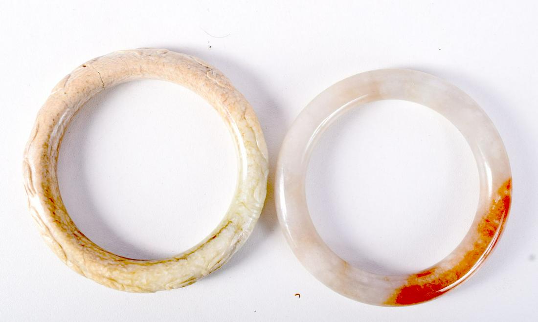 TWO CHINESE JADE BANGLES.  6.1cm internal diameter, total weight 134.8g (2) (1 of 3)