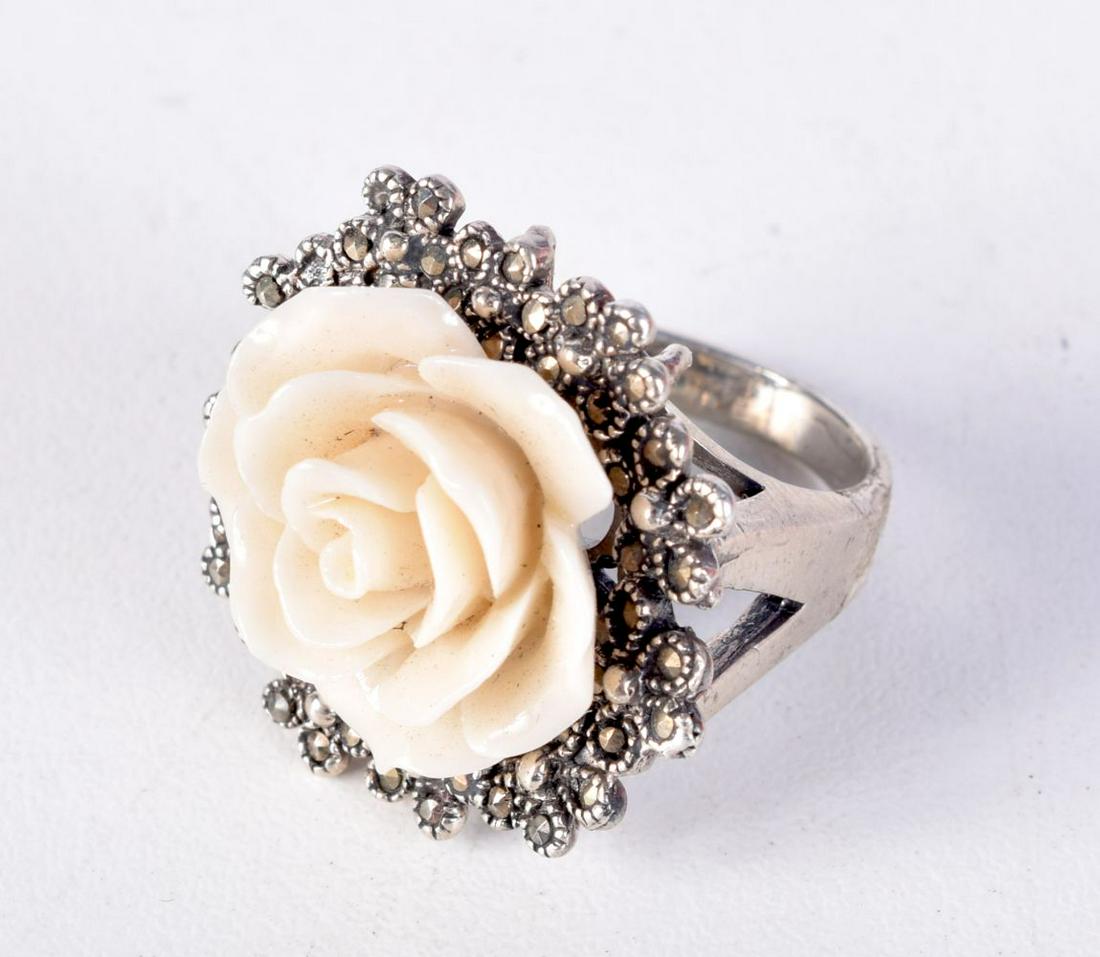 A SILVER AND MARCASITE FLOWER RING.  Size M, Stamped 925, weight 12g (1 of 3)
