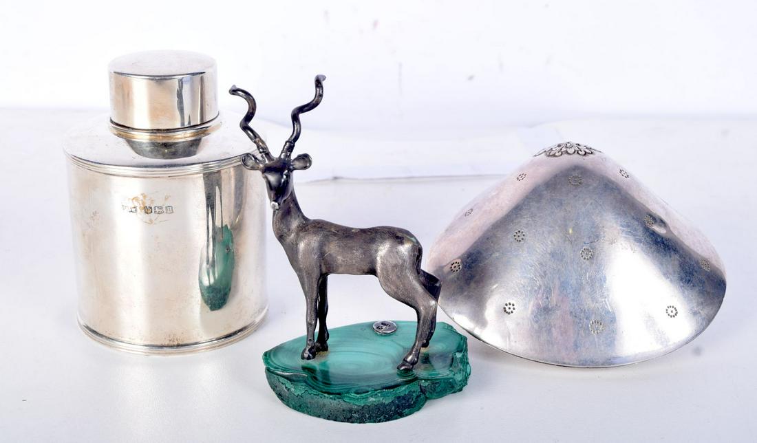 A MAPPIN & WEBB SILVER TEA CADDY TOGETHER WITH A CLAM SHELL BOX AND A WHITE METAL MODEL OF A DEER ON: A MAPPIN & WEBB SILVER TEA CADDY TOGETHER WITH A CLAM SHELL BOX AND A WHITE METAL MODEL OF A DEER ON A MALACHITE BASE, Caddy Hallmarked Sheffield 1930, 9.3cm 6.8cm