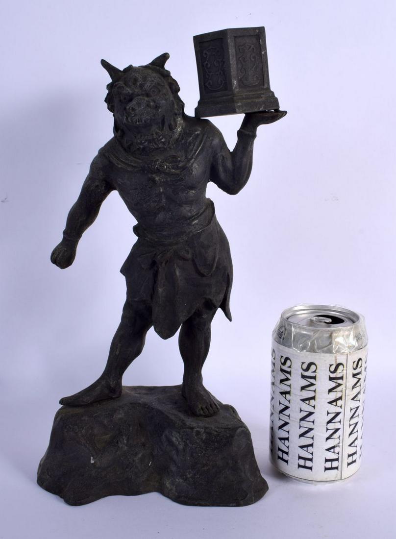 A LARGE 19TH CENTURY JAPANESE MEIJI PERIOD BRONZE OKIMONO modelled as a scowling god. 32 cm x 14 cm.: A LARGE 19TH CENTURY JAPANESE MEIJI PERIOD BRONZE OKIMONO modelled as a scowling god. 32 cm x 14 cm.