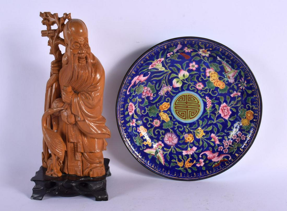 AN EARLY 20TH CENTURY CHINESE CARVED WOOD FIGURE OF SAGE together with a Canton enamel bat and moth (1 of 4)