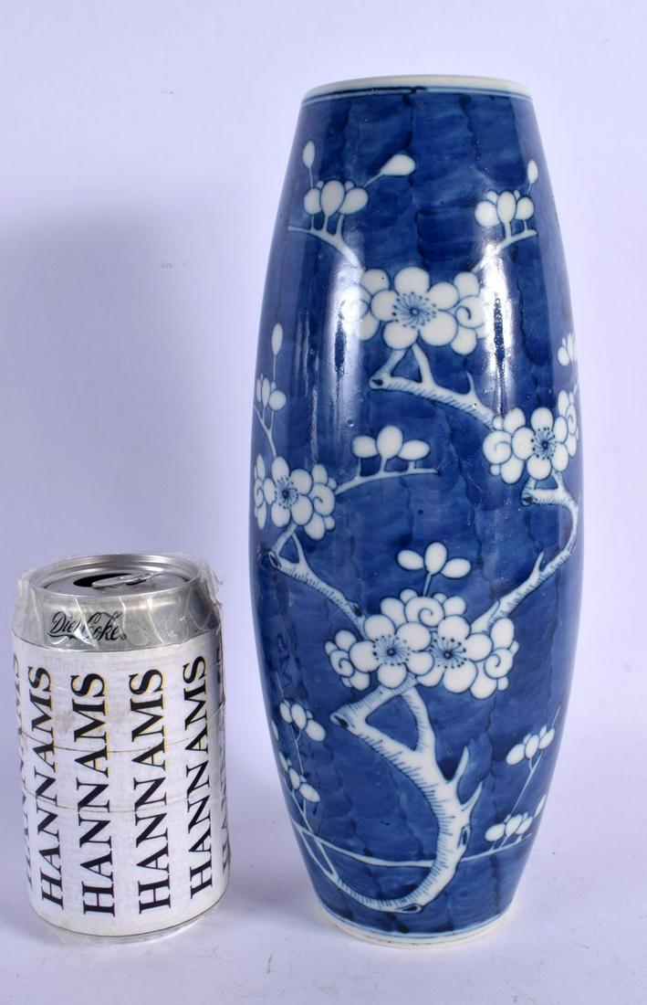 A 19TH CENTURY CHINESE BLUE AND WHITE PORCELAIN VASE bearing Kangxi marks to base, painted with prun (1 of 5)