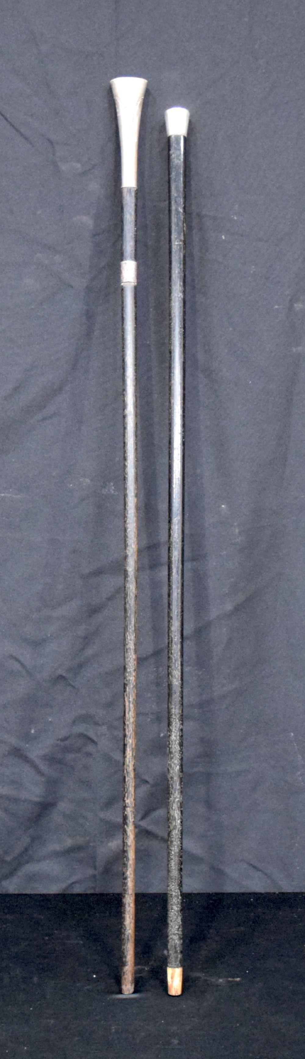 A walking cane with silver pommel together with another cane longest 92 cm (2). (1 of 5)
