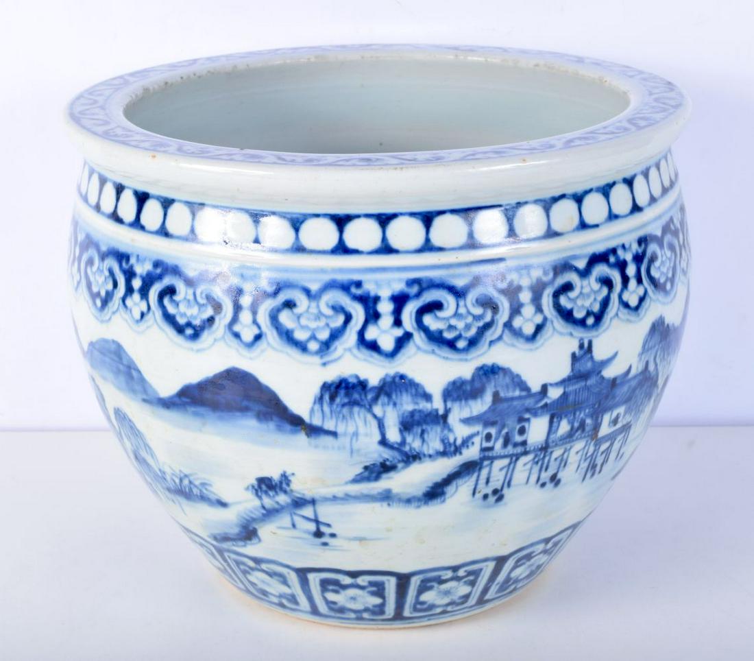 A 19th Century Chinese blue and white planter decorated with a lakeside settlement 25 x 33 cm (1 of 4)