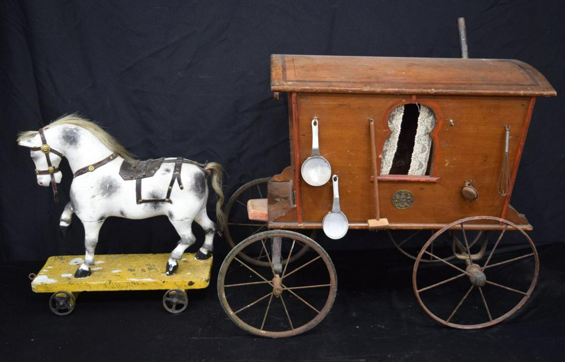 A large antique wooden model of a caravan with assorted domestic items together with an antique wood (1 of 4)