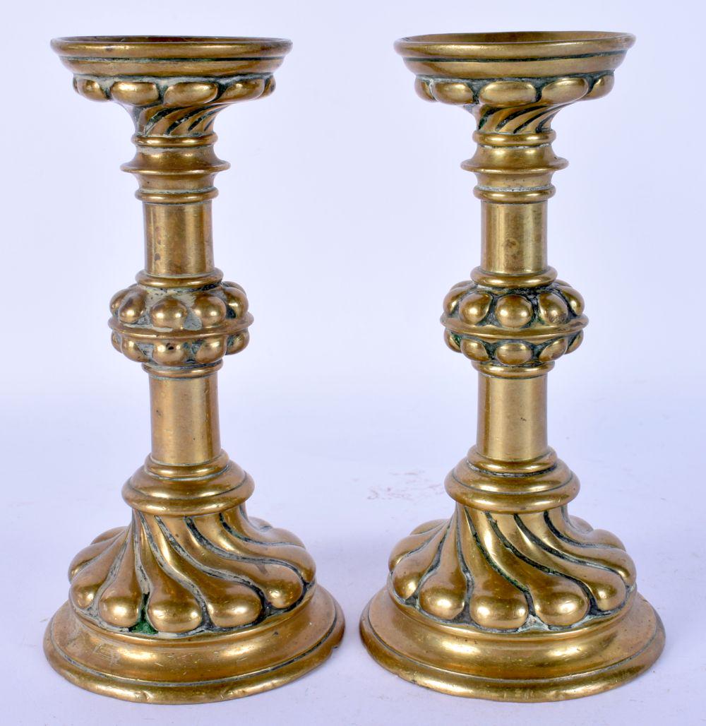 A PAIR OF 18TH CENTURY EUROPEAN BRONZE CANDLESTICKS. 15 cm high. (1 of 4)