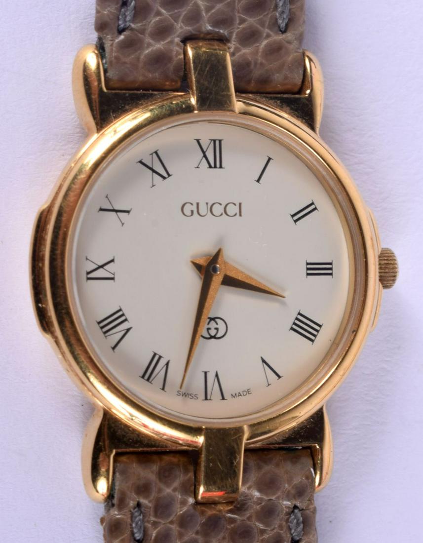 A BOXED LADIES GUCCI WRISTWATCH. 13 grams. 2.5 cm wide inc winder. (1 of 8)