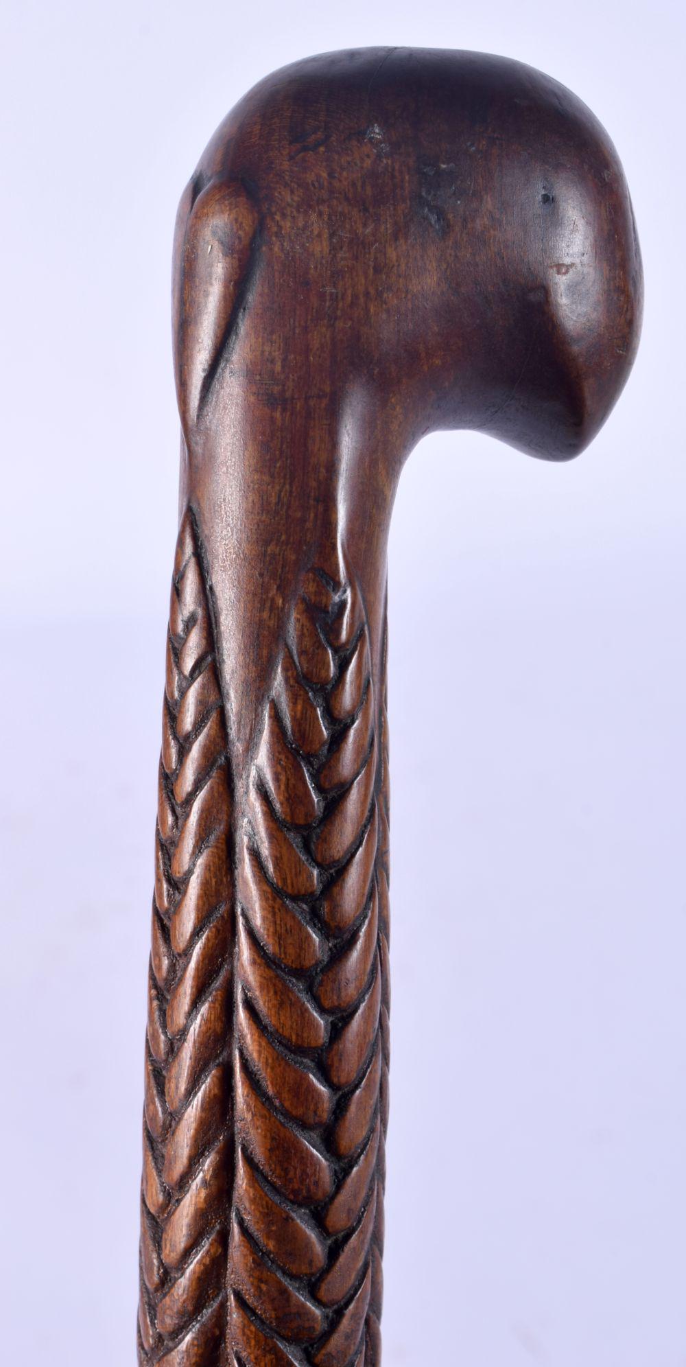 A RARE 19TH CENTURY EUROPEAN CARVED FOLK ART WALKING CANE formed as a birds head. 90 cm long.: A RARE 19TH CENTURY EUROPEAN CARVED FOLK ART WALKING CANE formed as a birds head. 90 cm long.