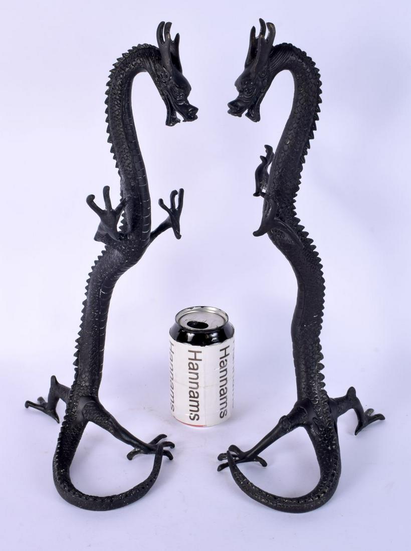 A LARGE PAIR OF JAPANESE BRONZE FREE STANDING DRAGONS of slender form. 40 cm high. (1 of 6)