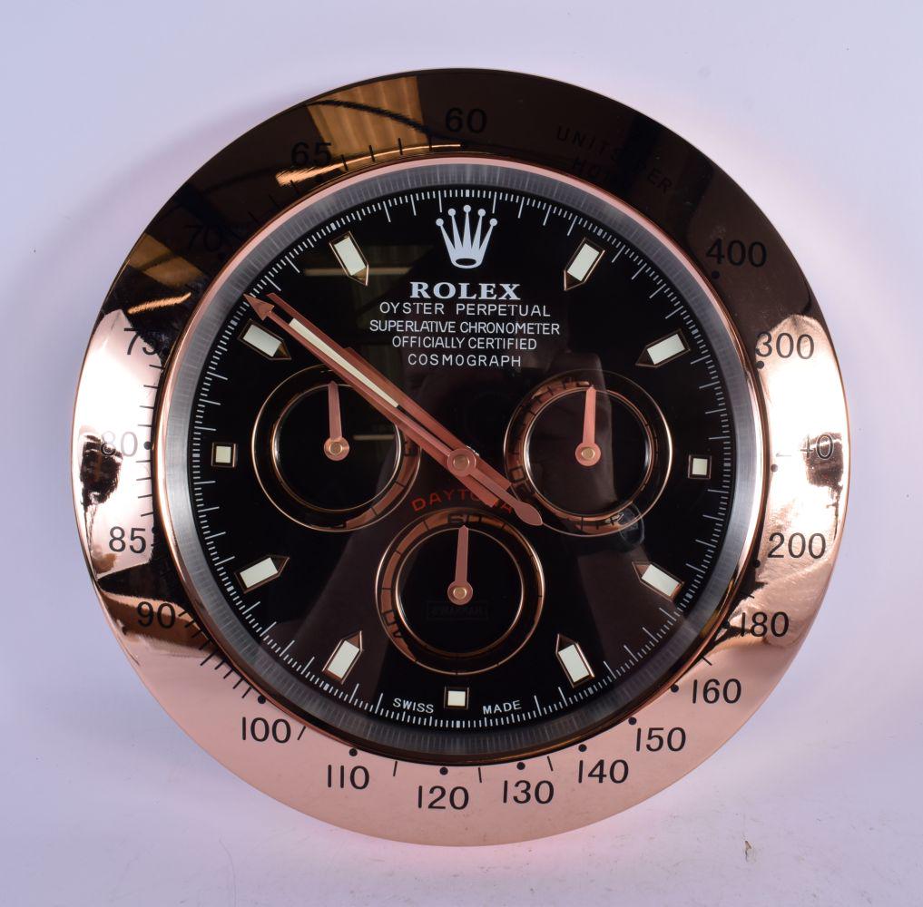 A ROLEX SHOP DISPLAY ADVERTISING WALL CLOCK. 33 cm diameter.: A ROLEX SHOP DISPLAY ADVERTISING WALL CLOCK. 33 cm diameter.
