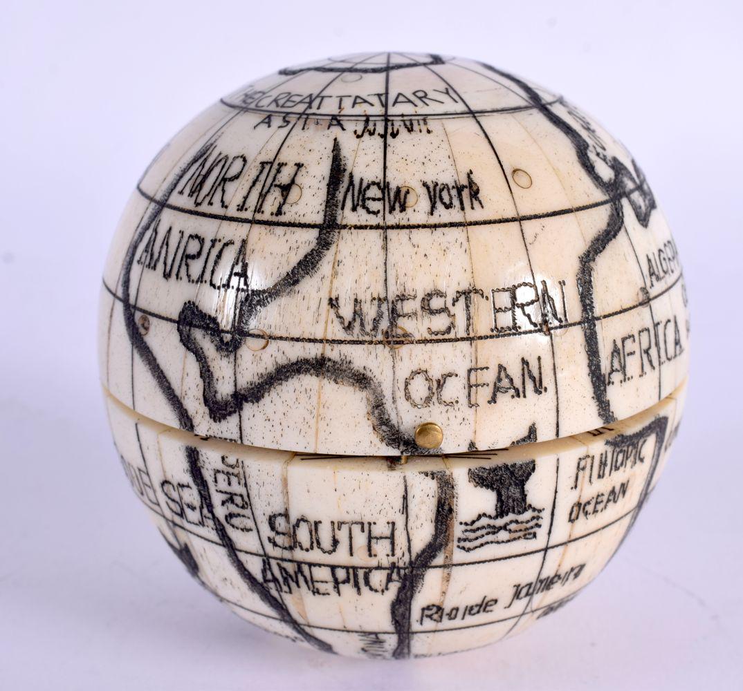 A CONTINENTAL BONE GLOBE COMPASS. 252 grams. 7 cm wide.: A CONTINENTAL BONE GLOBE COMPASS. 252 grams. 7 cm wide.