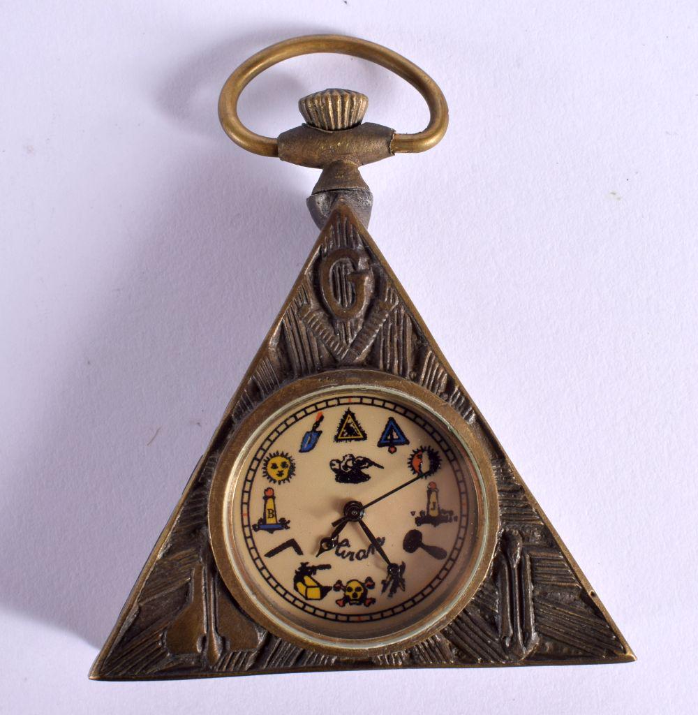 A CONTINENTAL MASONIC CLOCK. 84 grams. 6.5 cm x 5.5 cm. (1 of 3)