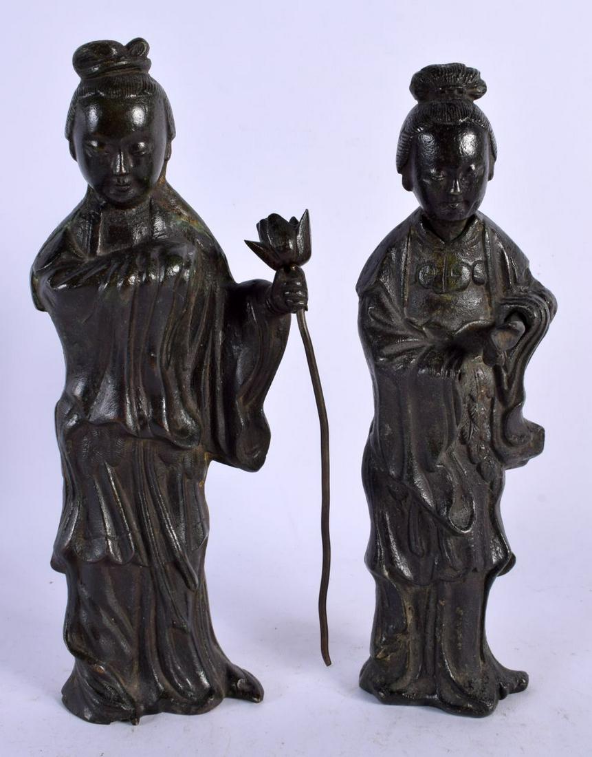 A PAIR OF 18TH CENTURY CHINESE BRONZE FIGURES OF FEMALES one modelled holding a flower. 25 cm high. (1 of 3)