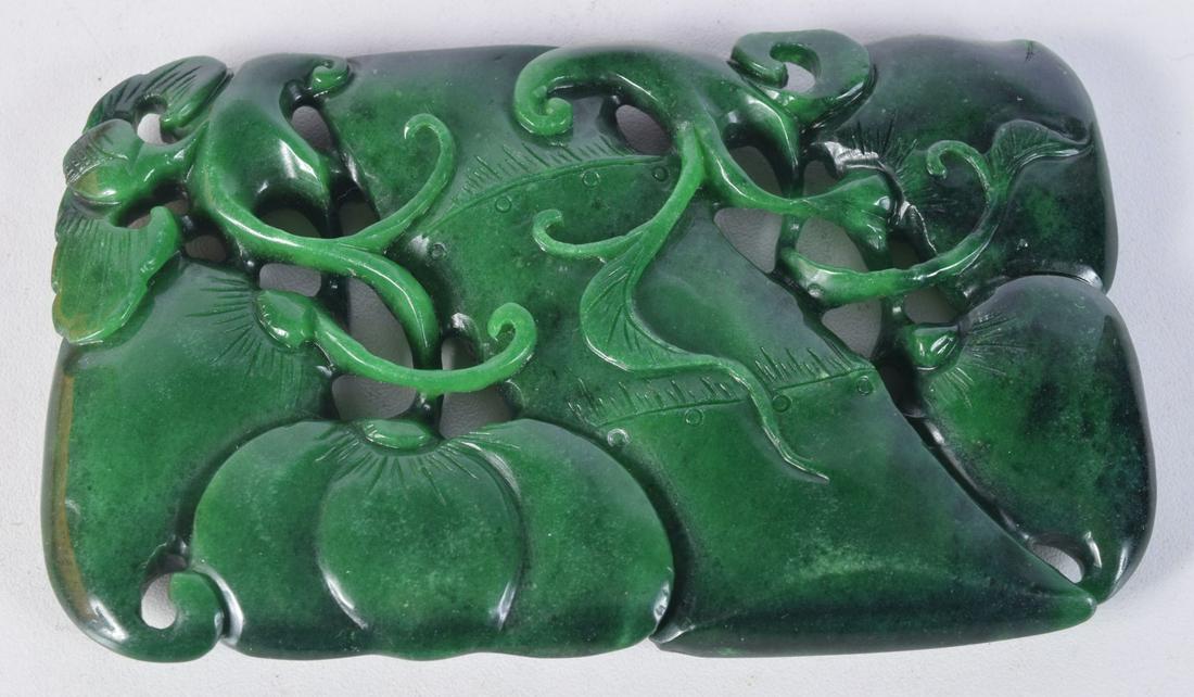 A Chinese carved Jade boulder in the form of a fruiting pod 11.5 x 7 cm. (1 of 3)