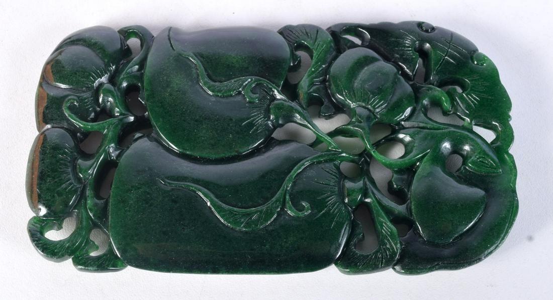 A Chinese carved Jade boulder in the form of a fruiting pod 13 x 7 cm. (1 of 3)