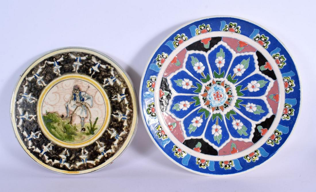 A TURKISH KUTAYAH POTTERY DISH together with an unusual Middle Eastern dish  painted with a hunter. (1 of 4)