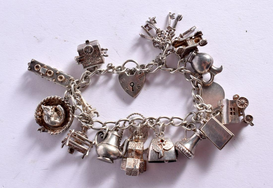 SILVER CHARM BRACELET. Weight 54g: SILVER CHARM BRACELET. Weight 54g