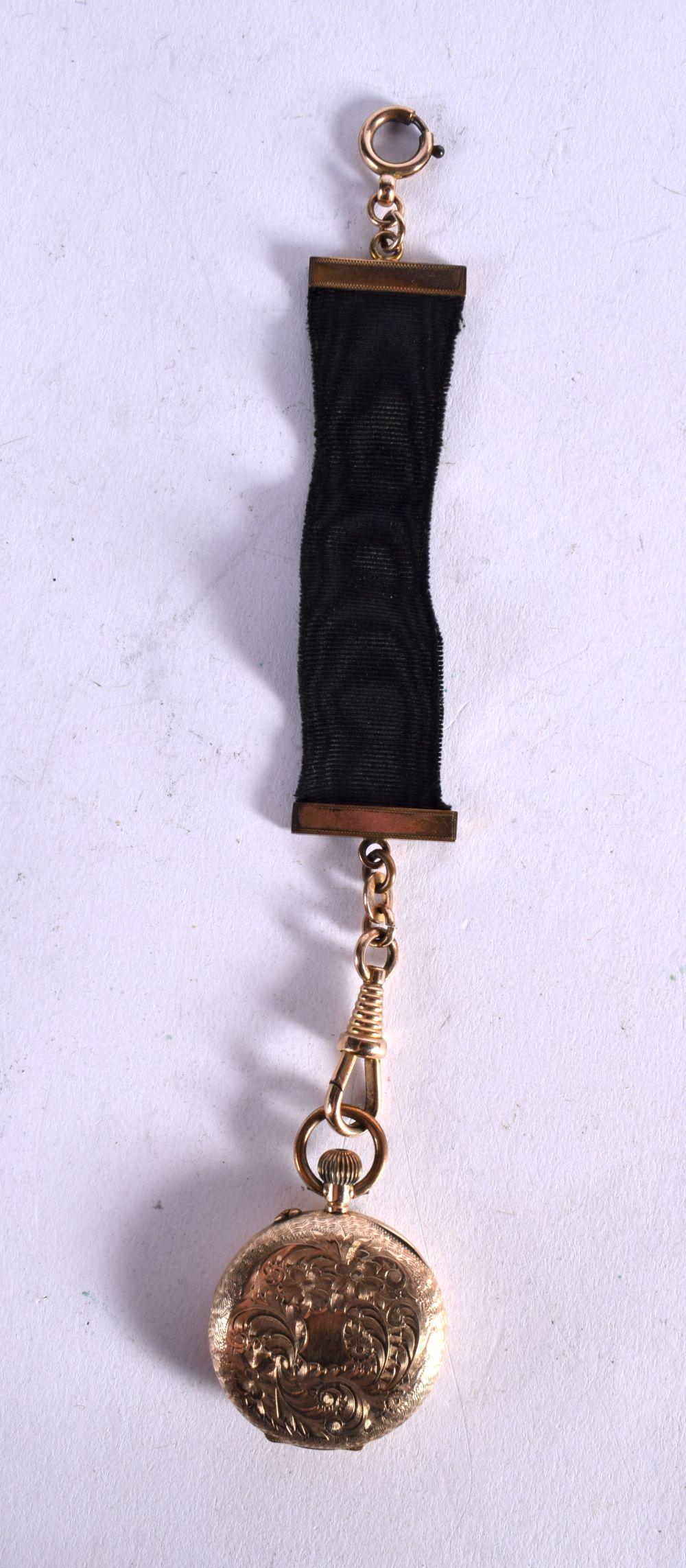 A 14CT GOLD LADIES FOB WATCH. Case stamped 14K 3cm diameter weight 27.1g: A 14CT GOLD LADIES FOB WATCH. Case stamped 14K 3cm diameter weight 27.1g