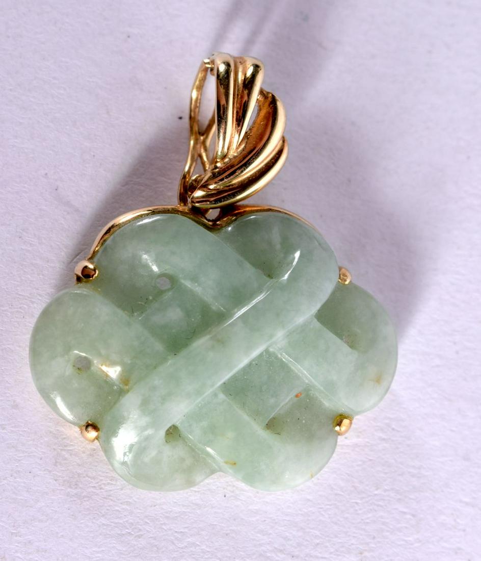A 14K GOLD MOUNTED JADE PENDANT.  Stamped 14K  3cm x 2.5cm  weight 5.2g (1 of 2)