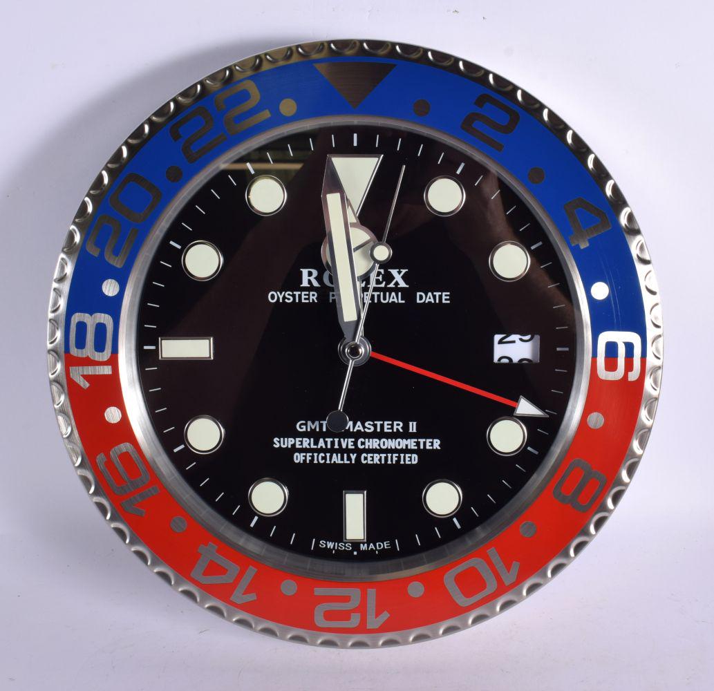 A ROLEX SHOP DISPLAY ADVERTISING WALL CLOCK. 33 cm diameter.: A ROLEX SHOP DISPLAY ADVERTISING WALL CLOCK. 33 cm diameter.
