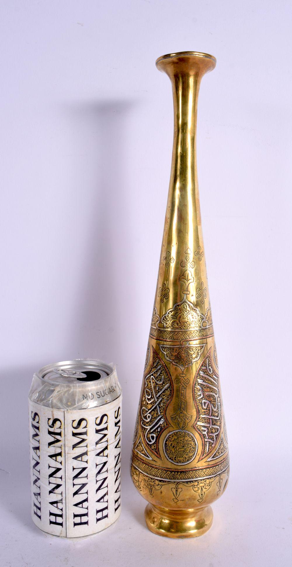 A LARGE LATE 19TH CENTURY MIDDLE EASTERN SILVER INLAID VASE decorated with calligraphy. 33 cm high. (1 of 7)