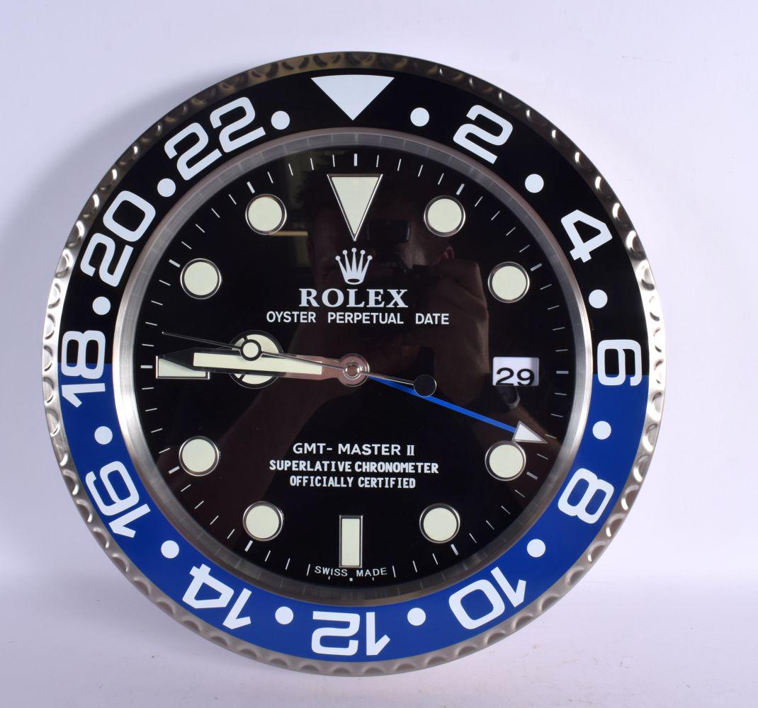 A ROLEX SHOP DISPLAY ADVERTISING WALL CLOCK. 33 cm diameter. (1 of 2)