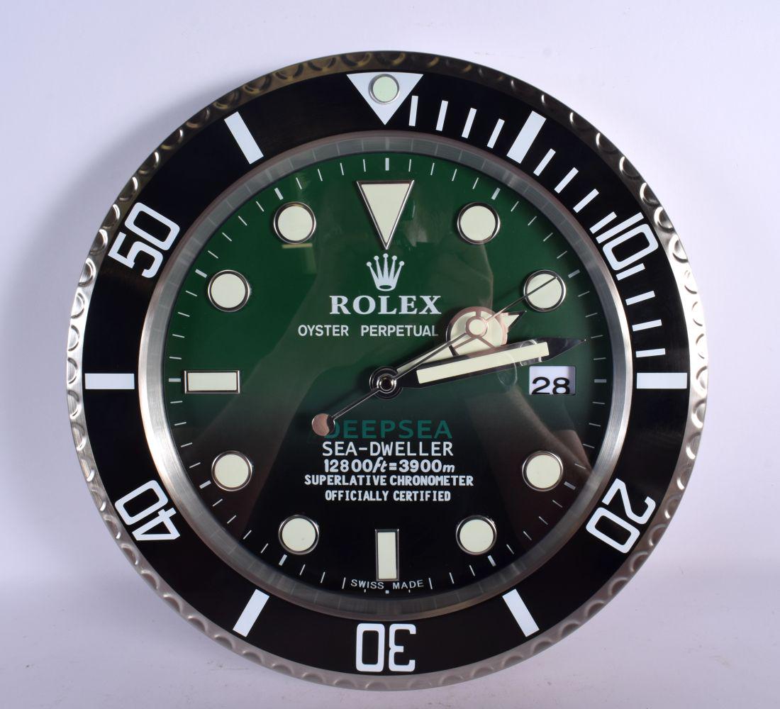 A ROLEX SHOP DISPLAY ADVERTISING WALL CLOCK. 33 cm diameter. (1 of 2)