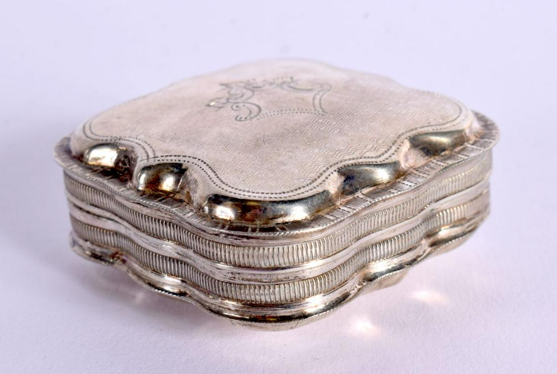 A STERLING SILVER PILL BOX WITH ENGINE TURNED DECORATION WITH A VACANT CARTOUCHE.  Stamped Sterling, (1 of 4)