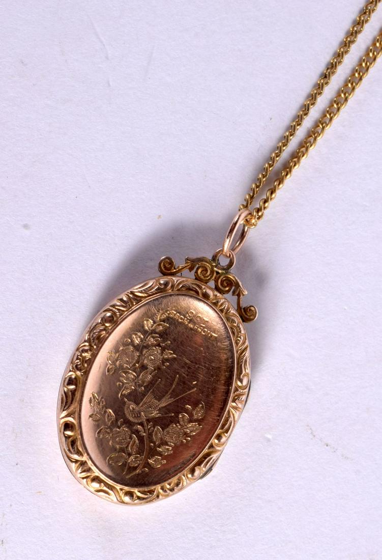 A 9CT GOLD LOCKET on chain. 6.4 grams. 44 cm long. (1 of 3)