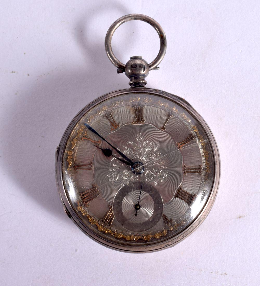 AN ANTIQUE SILVER POCKET WATCH. London 1863. 100 grams. 4.75 cm diameter. (1 of 3)