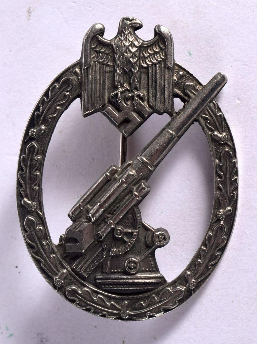 GERMAN LUFTWAFFE FLAK GUNNER ANTI AIRCRAFT BADGE POST WW2 1957 PATTERN.  5.9cm x 4.3cm, weight 36.5g (1 of 2)