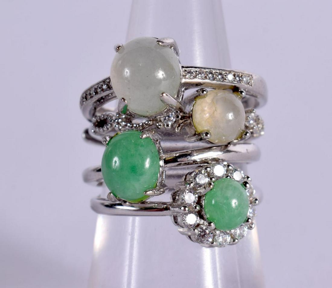 FOUR CONTINENTAL SILVER AND JADE RINGS.  Stamped 925, Sizes K, N, P. total weight 7.1g (1 of 2)