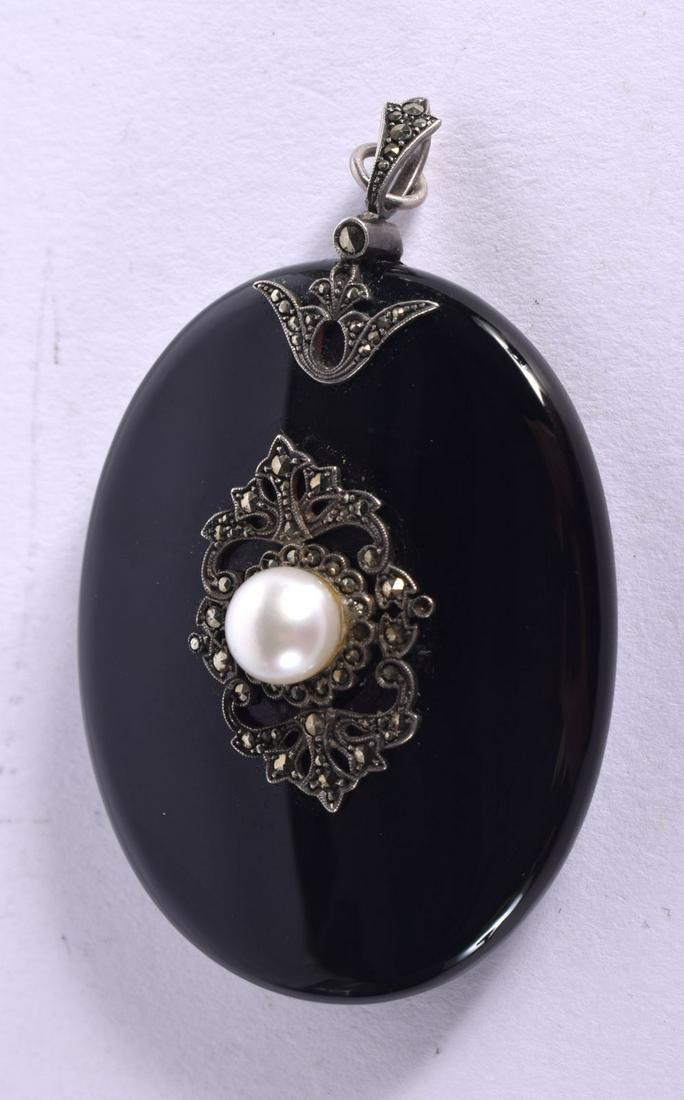 A VICTORIAN ENAMEL, PEARL AND MARCASITE LOCKET. 6cm x 4.1cm, weight 33.4g: A VICTORIAN ENAMEL, PEARL AND MARCASITE LOCKET. 6cm x 4.1cm, weight 33.4g