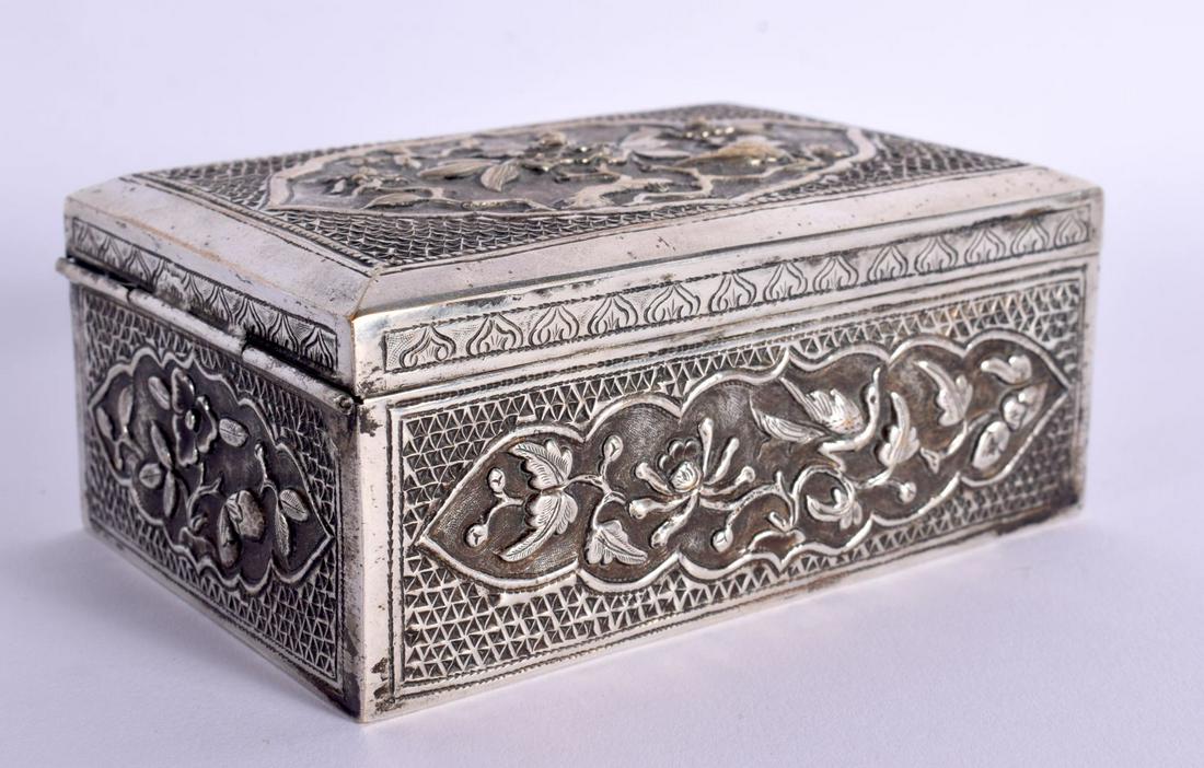 A 19TH CENTURY CHINESE EXPORT WHITE METAL BOX AND COVER decorated in relief with birds. 215 grams. 1: A 19TH CENTURY CHINESE EXPORT WHITE METAL BOX AND COVER decorated in relief with birds. 215 grams. 11.5 cm x 8.5 cm.