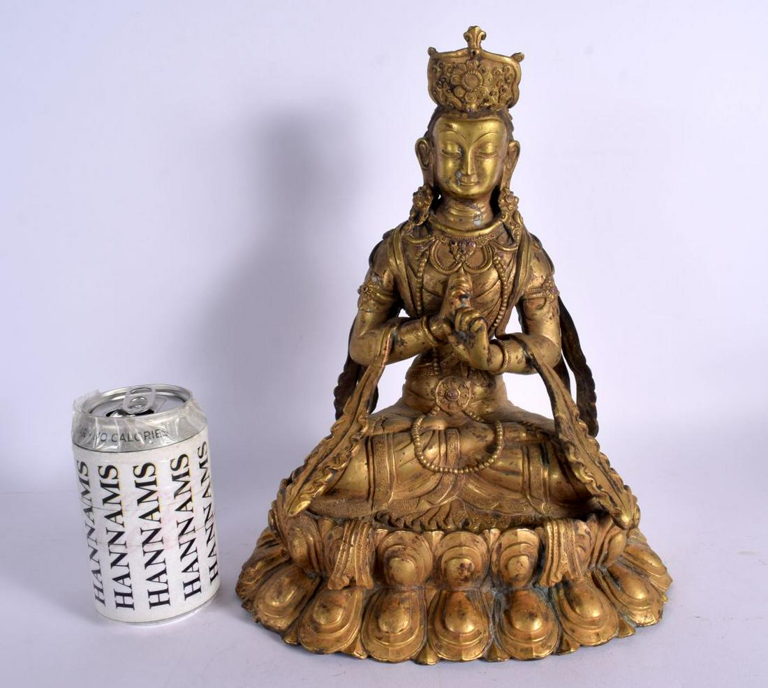 A LARGE EARLY 20TH CENTURY CHINESE TIBETAN BRONZE FIGURE OF A BUDDHA modelled with hands clasped, be (1 of 7)