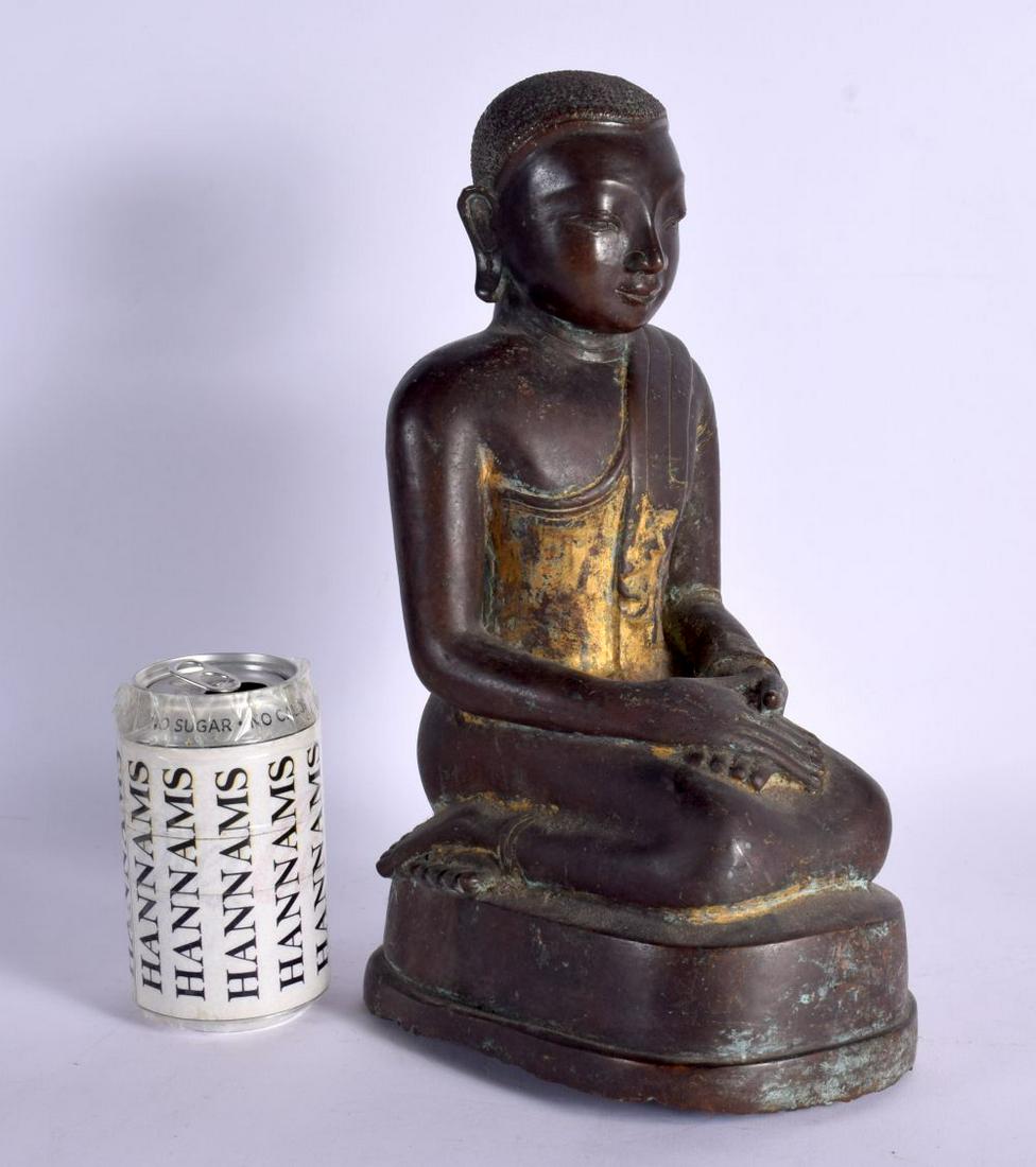 A LARGE 19TH CENTURY SOUTH EAST ASIAN BURMESE BRONZE FIGURE OF A BUDDHA elegantly modelled with clas (1 of 6)