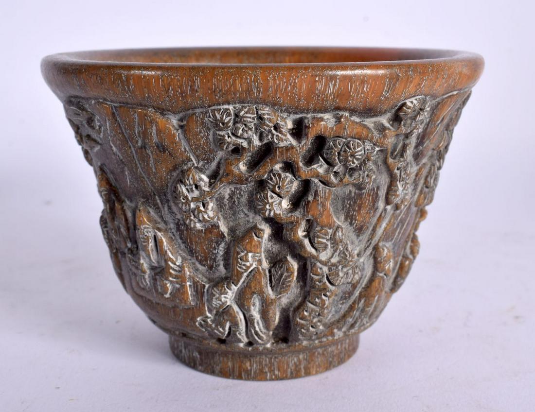 A CHINESE CARVED BUFFALO HORN TYPE LIBATION CUP 20th Century. 11 cm x 8 cm.: A CHINESE CARVED BUFFALO HORN TYPE LIBATION CUP 20th Century. 11 cm x 8 cm.