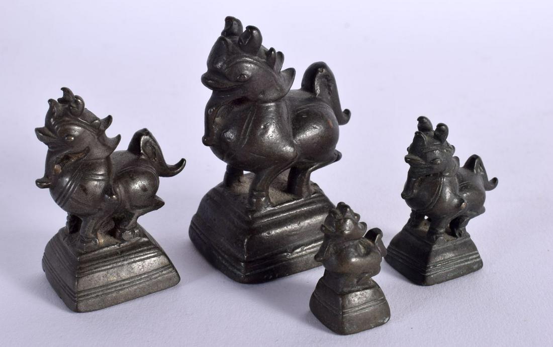 FOUR ANTIQUE INDIAN BRONZE OPIUM WEIGHTS. (4) (1 of 3)