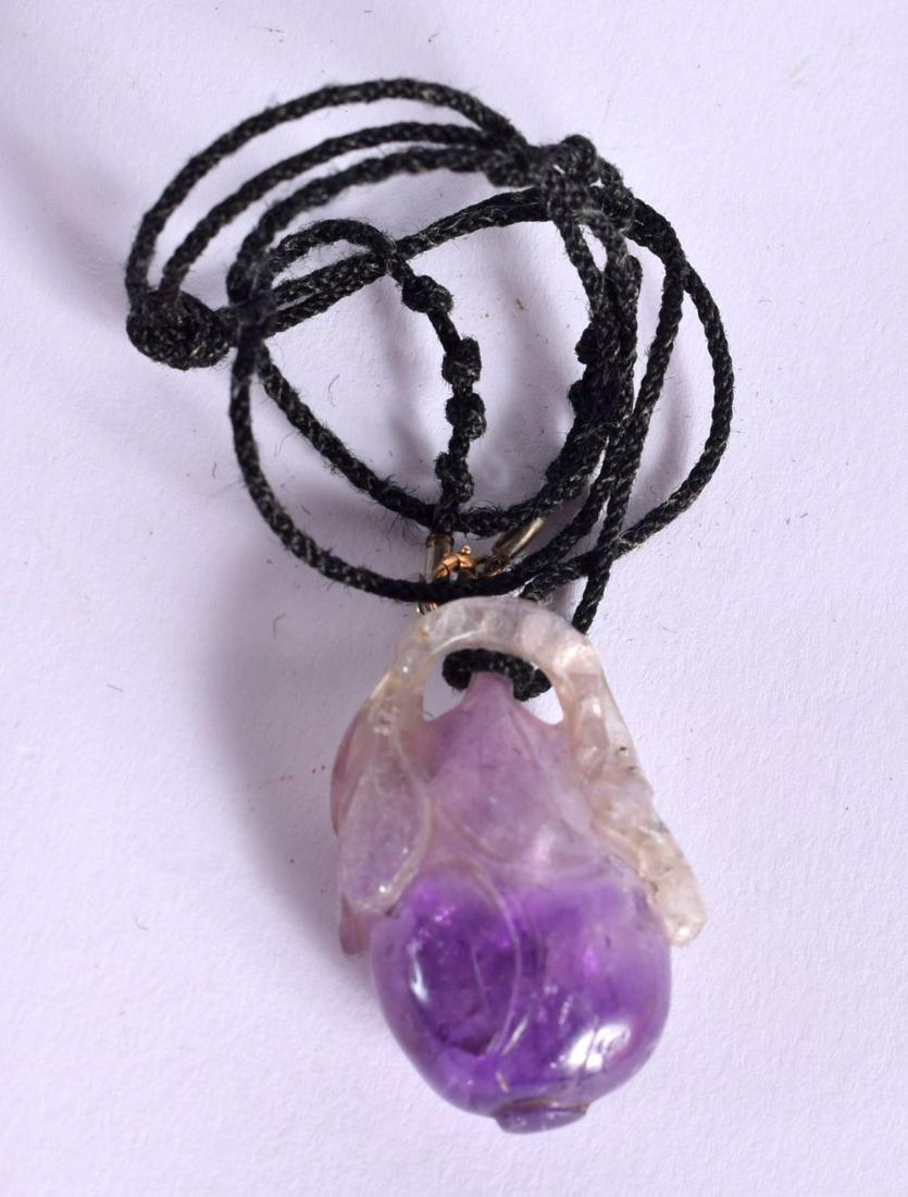 A 19TH CENTURY CHINESE CARVED AMETHYST PENDANT Qing. Pendant 3.5 cm x 2.25 cm. (1 of 2)