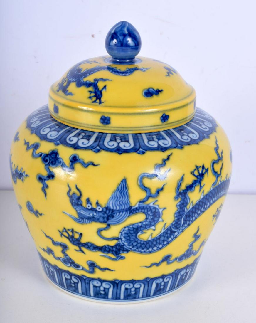 A Chinese porcelain Imperial yellow ginger jar and cover decorated with dragons 16 cm. (1 of 5)