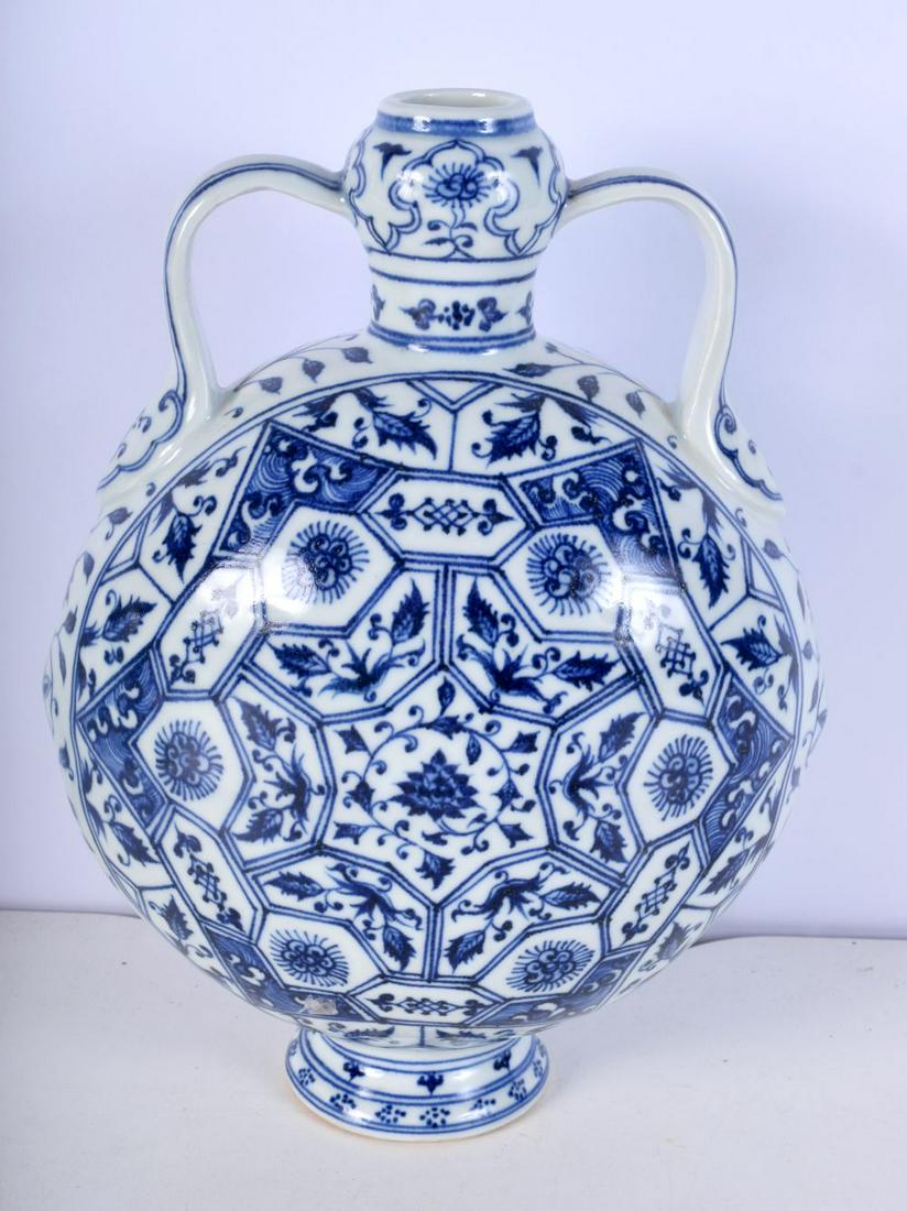 A Chinese Porcelain blue and white moon flask decorated  with lotus 28 cm. (1 of 5)
