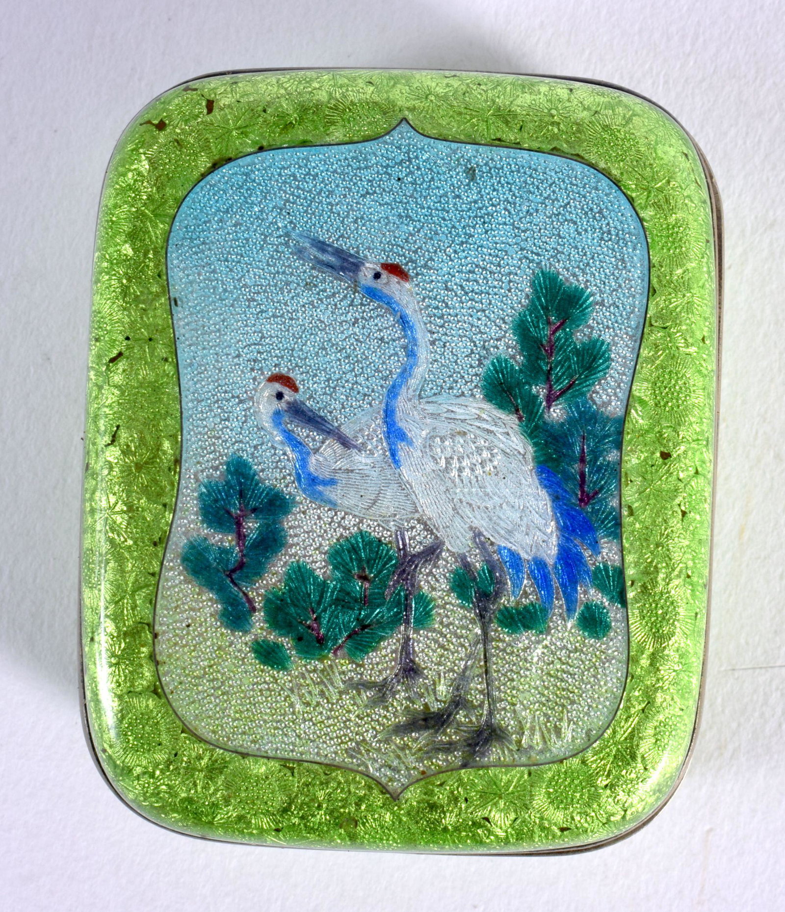 A SMALL 19TH CENTURY JAPANESE MEIJI PERIOD CLOISONNE ENAMEL BOX AND COVER decorated with two birds.: A SMALL 19TH CENTURY JAPANESE MEIJI PERIOD CLOISONNE ENAMEL BOX AND COVER decorated with two birds. 6 cm x 5 cm.